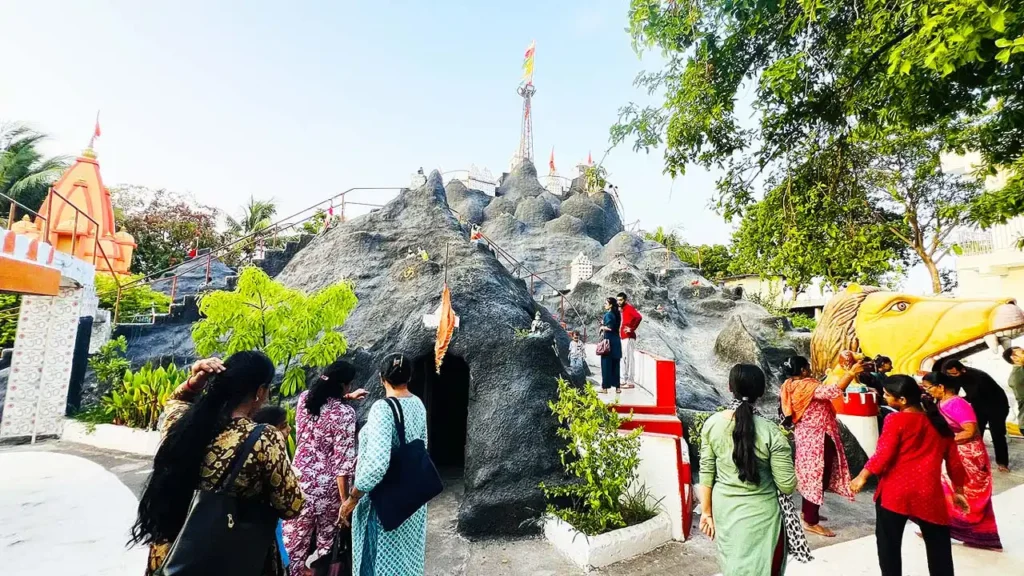 Mini Girnar Ram Madhi Surat full view with devotees cave entrance and rocky structure