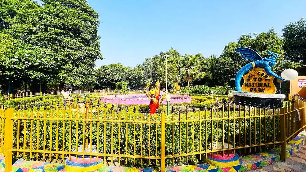 Welcome to Natural Park garden behind Gurukul Surat with statue and trees