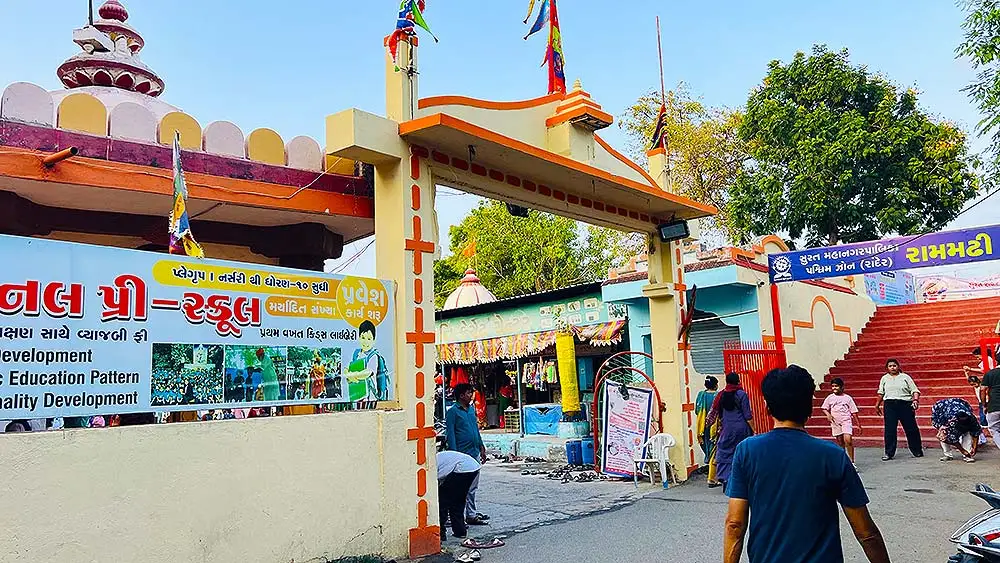 Ram Madhi Surat main entry gate at Jahangirpura with Ram Madhi signboard and visitors
