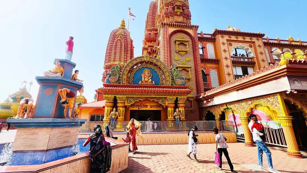 Ornate Sanskritik Pradarshan building entrance with Ganesh idol at Gurukul Surat