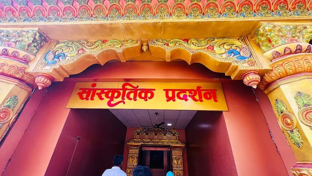 Sanskritik Pradarshan entry gate with red signboard at Gurukul Surat