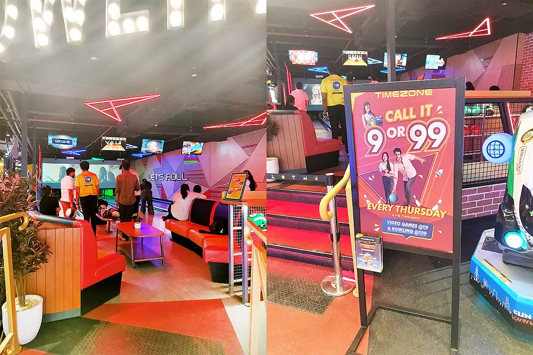 Timezone bowling alley at Surat VR Mall with red booth seating and a Call It 9 or 99 Thursday offer board