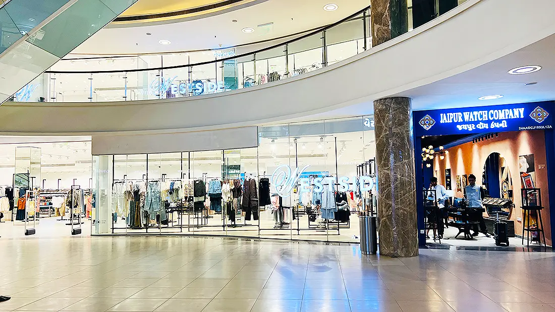 Westside clothing showroom at Surat VR Mall with glass front, next to Jaipur Watch Company outlet